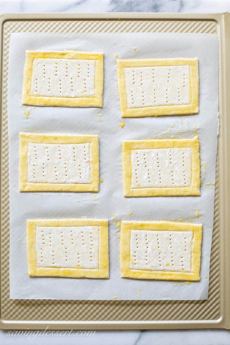 Puff Pastry rectangles brushed with an egg wash and pricked with a fork