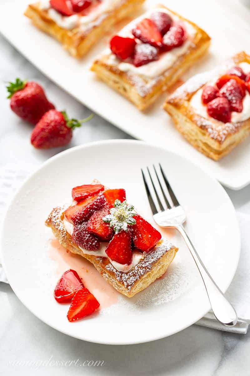 Overhead view of a puff pastry tart on a plate