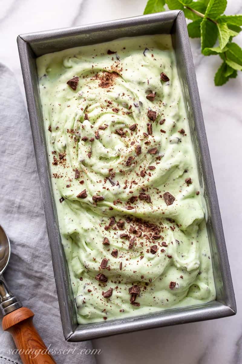 Overhead view of a pan filled with mint chocolate chip ice cream