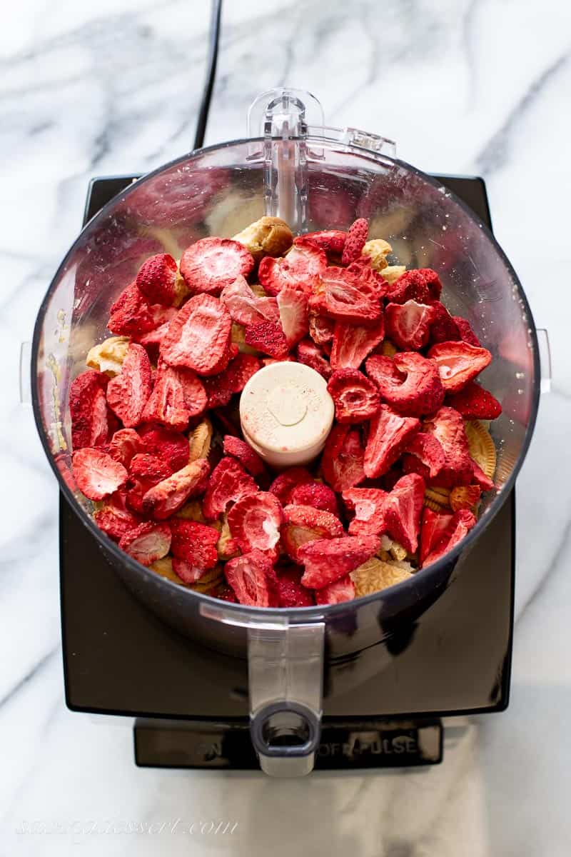 freeze dried strawberries in the bowl of a food processor
