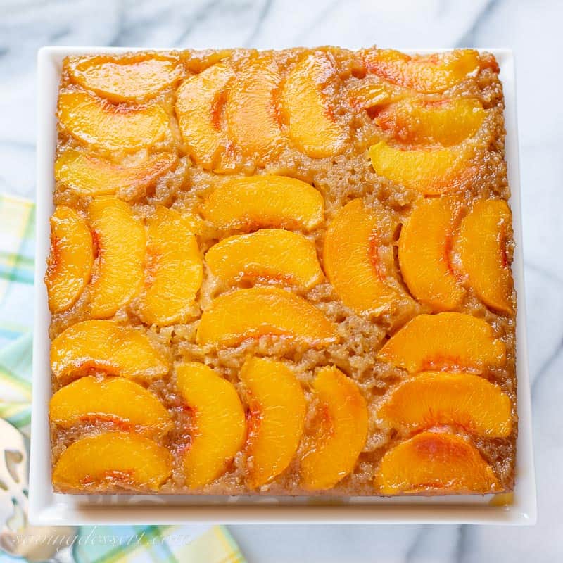 overhead view of a square peach upside down cake