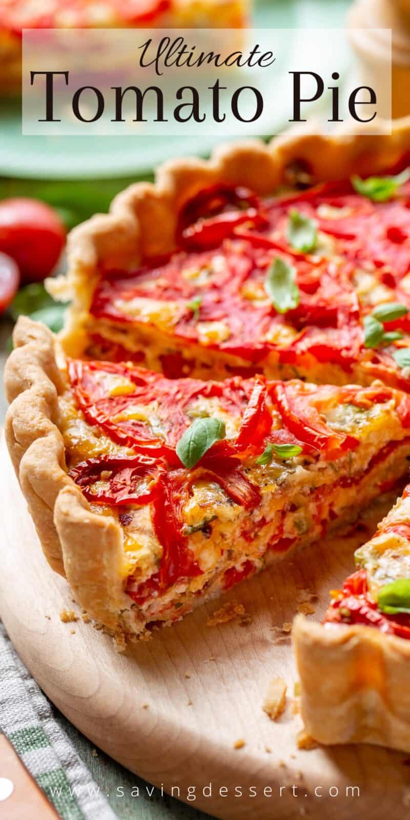 a side view of a sliced tomato tart with fresh basil leaves