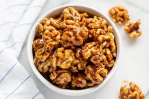 A bowl of candied walnuts