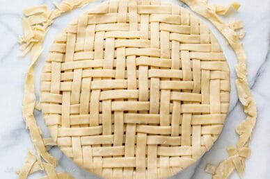 A lattice topped pie not yet baked