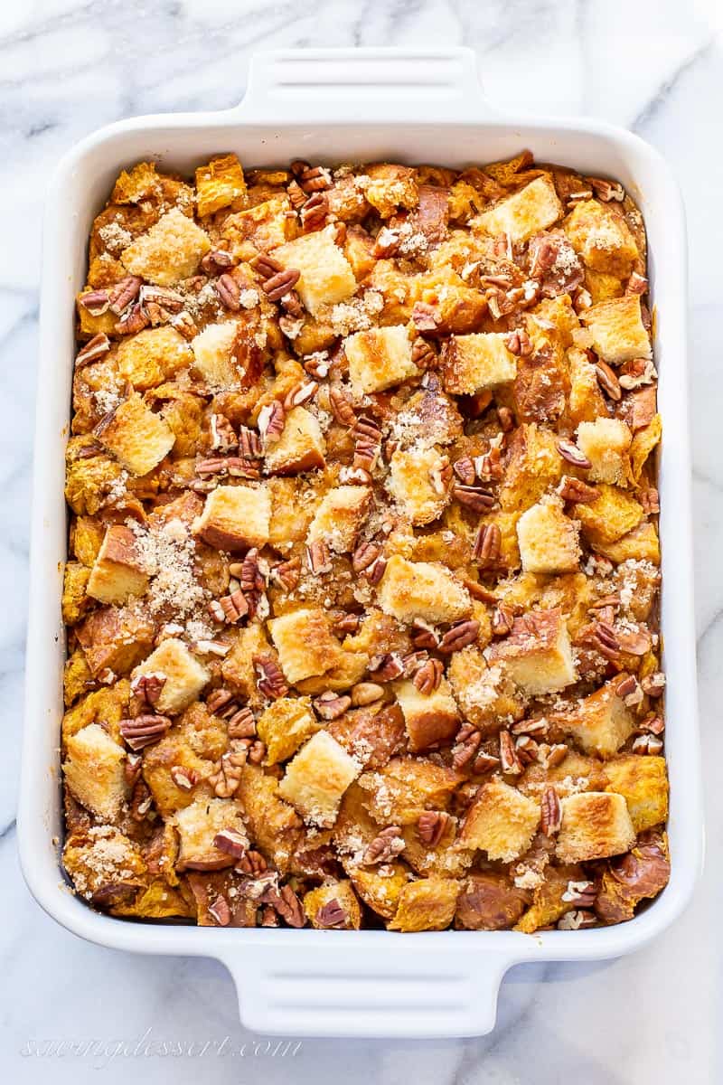 a casserole dish filled with fresh baked bread pudding