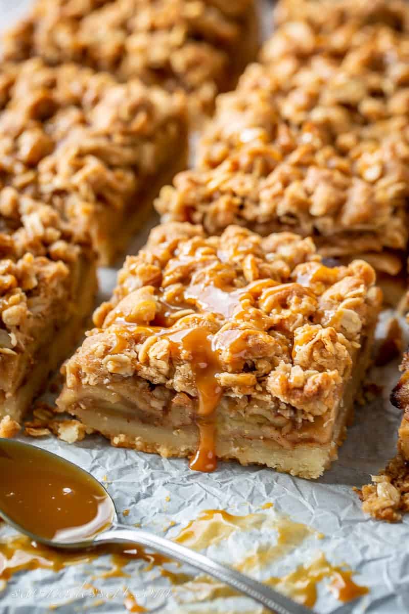 caramel drizzled over apple pie bars