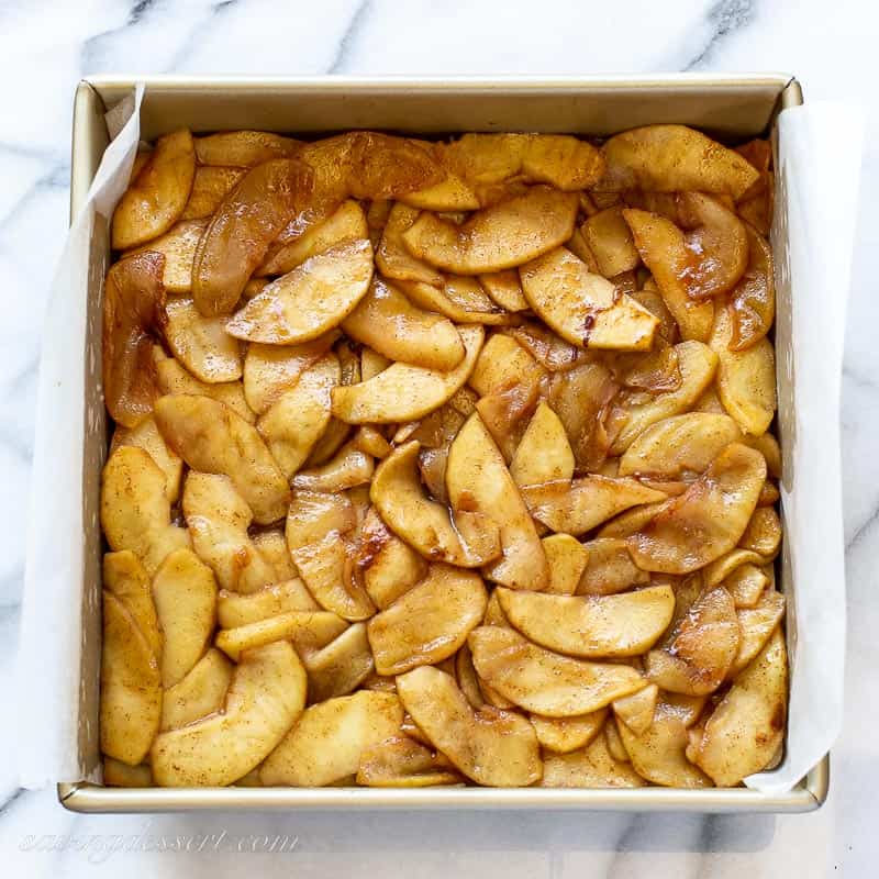 a pan of apples over a shortbread crust