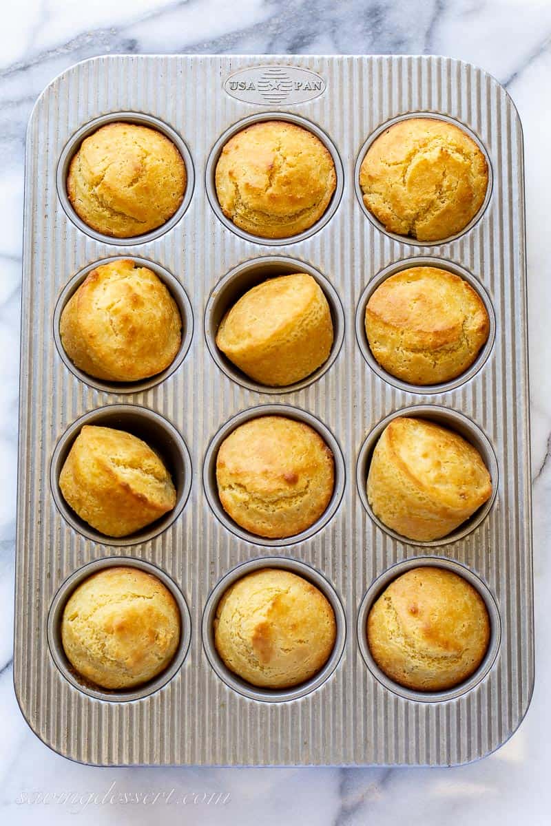 Baked corn muffins in a muffin tin