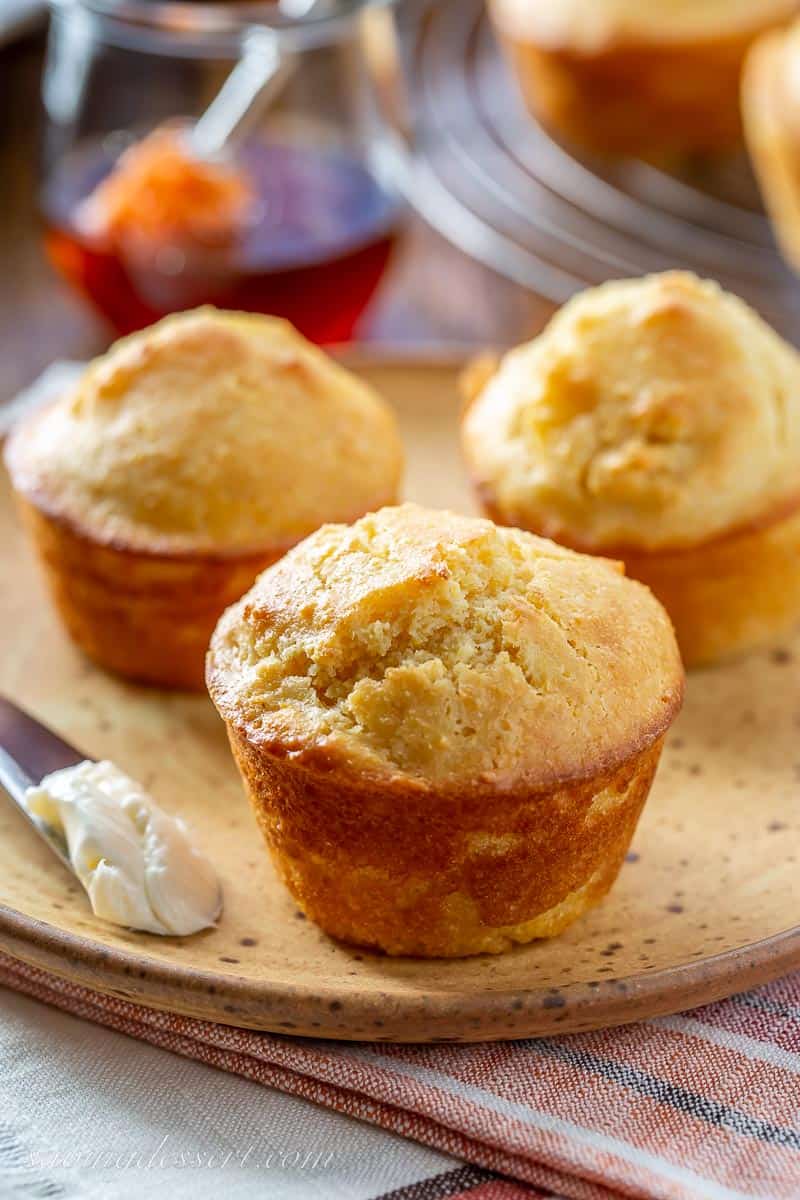 Big fluffy corn muffins on a plate