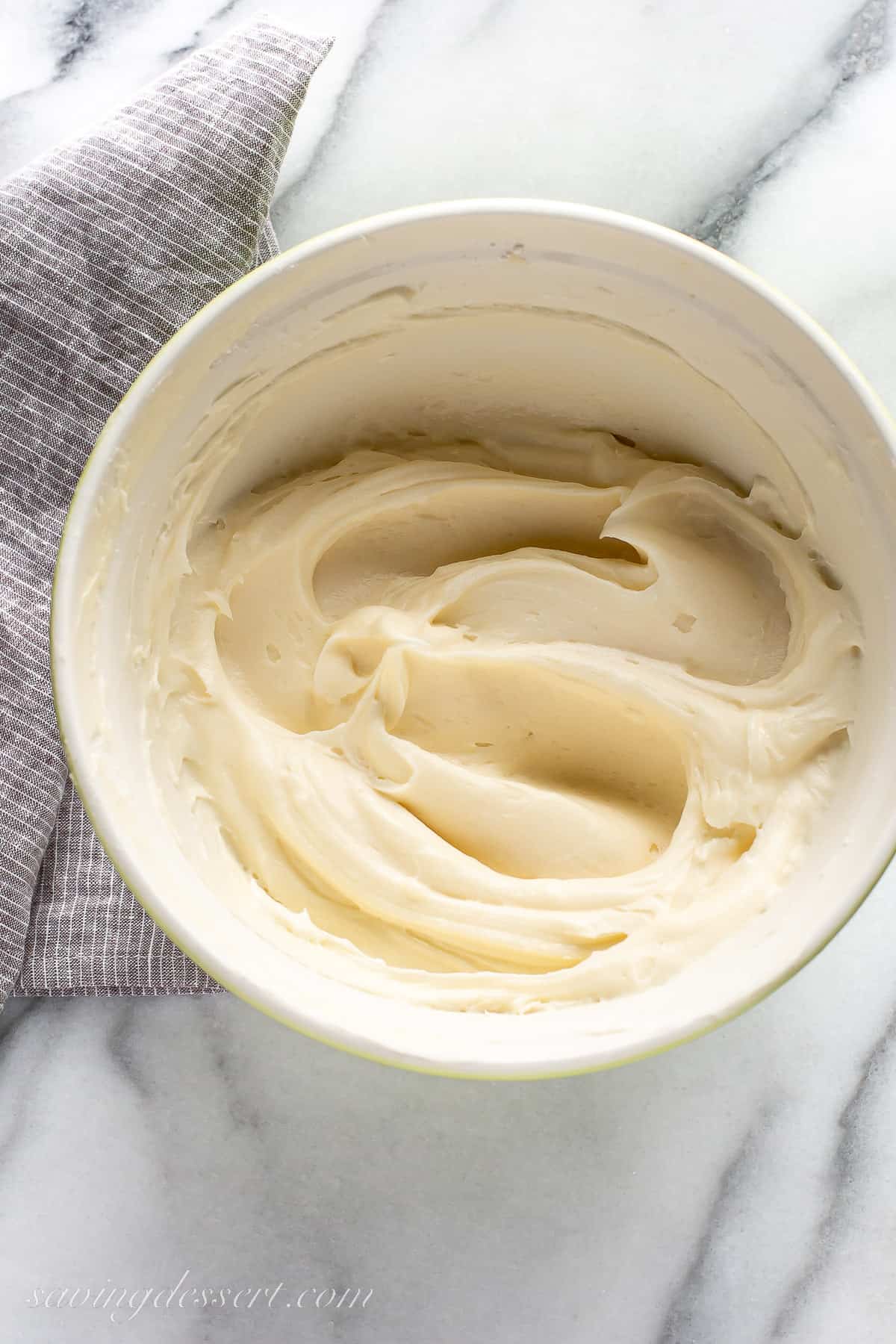 A bowl of cream cheese frosting