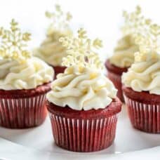 Red velvet cupcakes on a cake platter