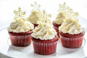 Red velvet cupcakes on a cake platter