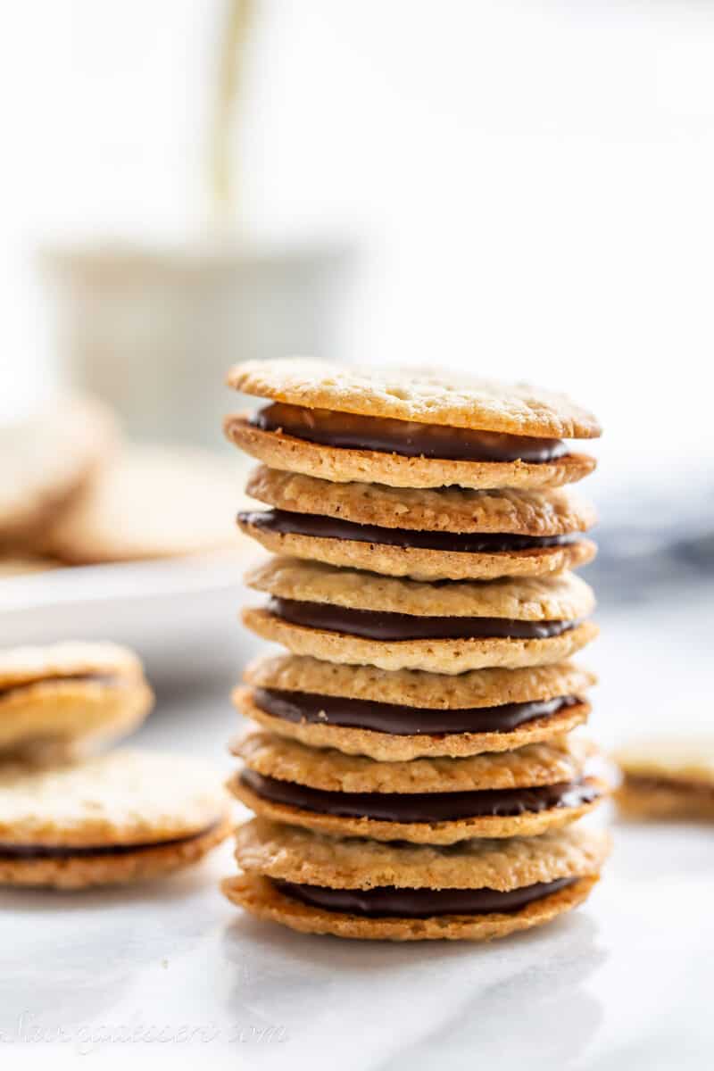 a stack of chocolate filled brussels cookies