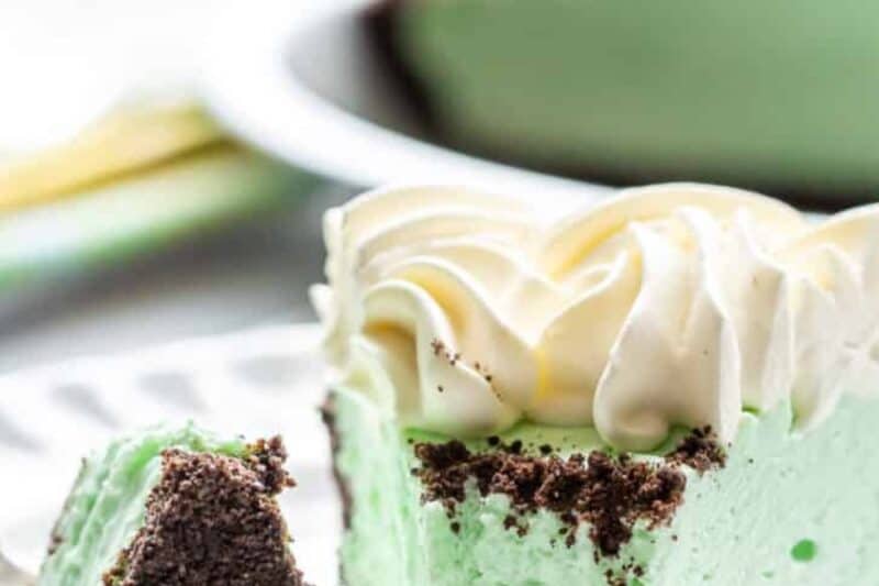 A slice of grasshopper pie on a plate.