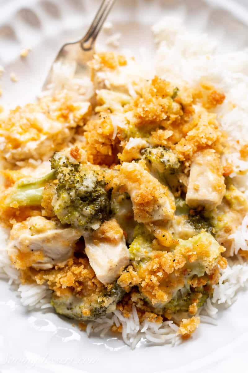 chicken divan with broccoli in a bowl with a fork