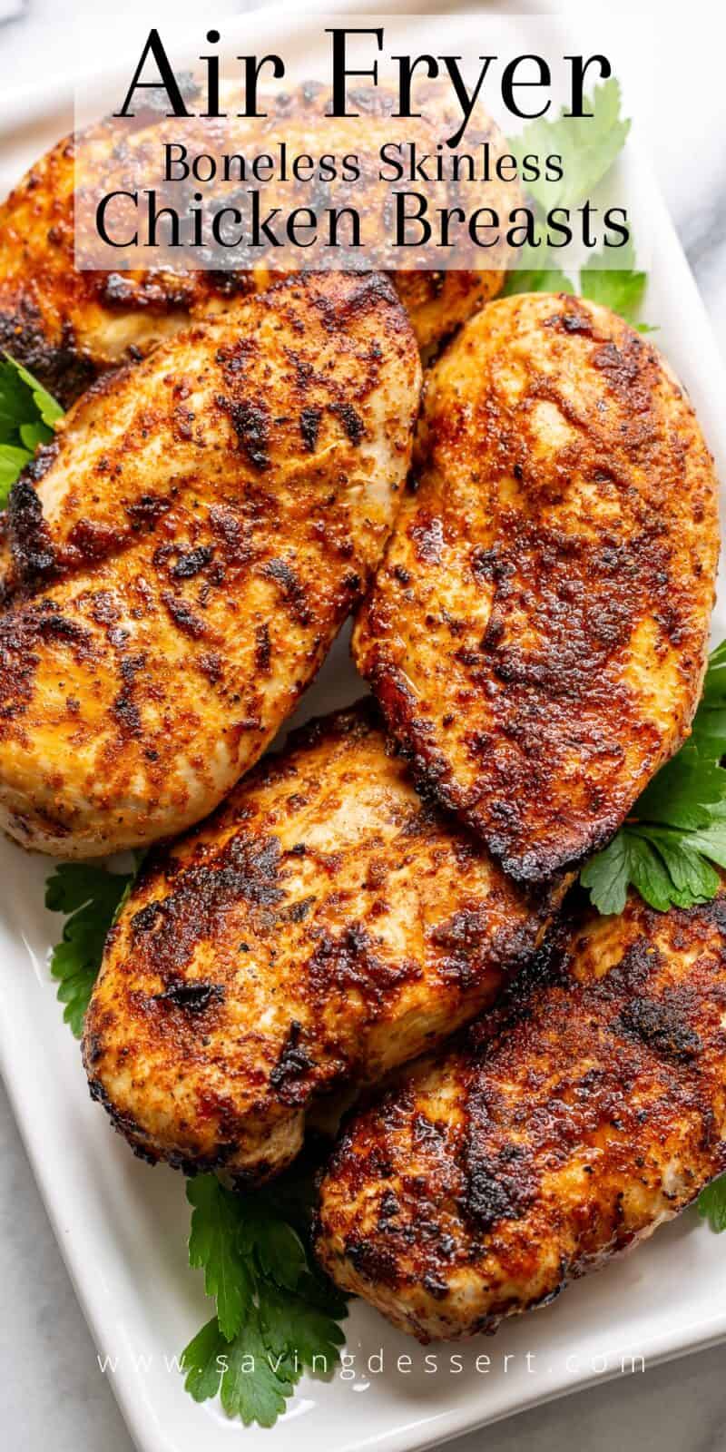 a platter filled with air fryer boneless chicken breasts with rotisserie chicken seasoning