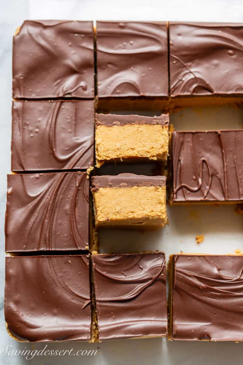 an overhead view of a pan of sliced peanut butter bars