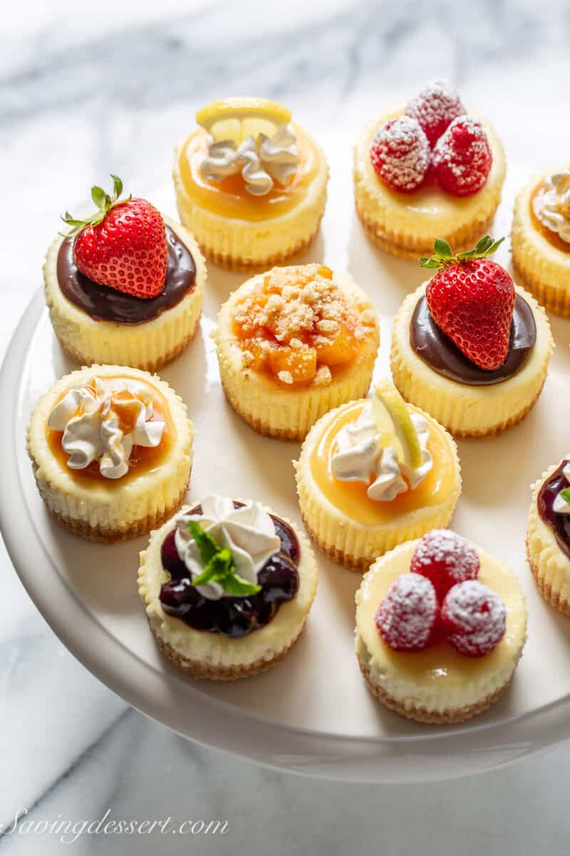 Overhead view of a platter filled with assorted mini cheesecake recipe