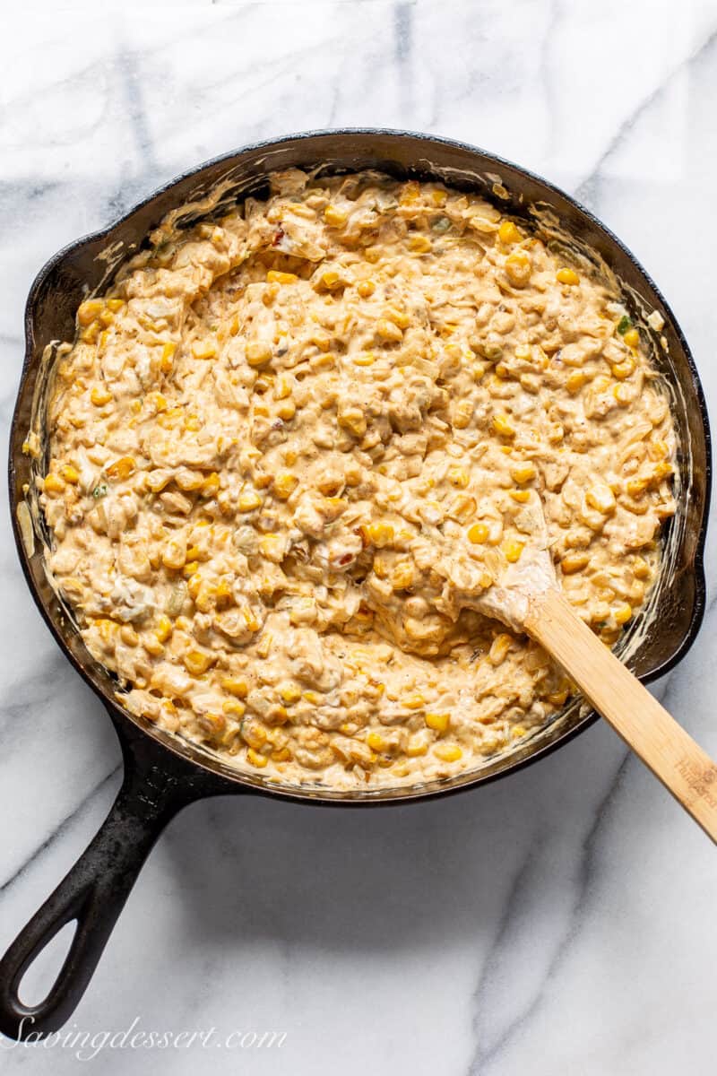 cheesy corn dip in a skillet