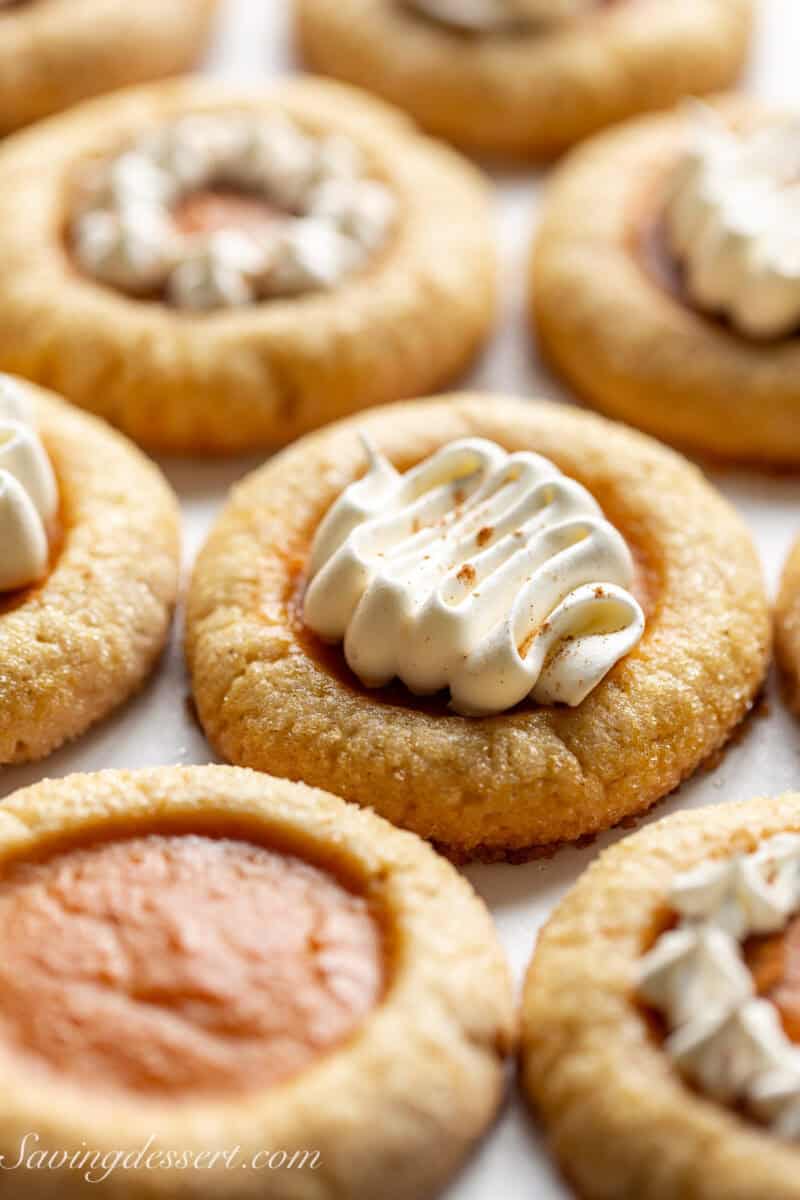 Pumpkin pie cookies with a swirl of cool whip.