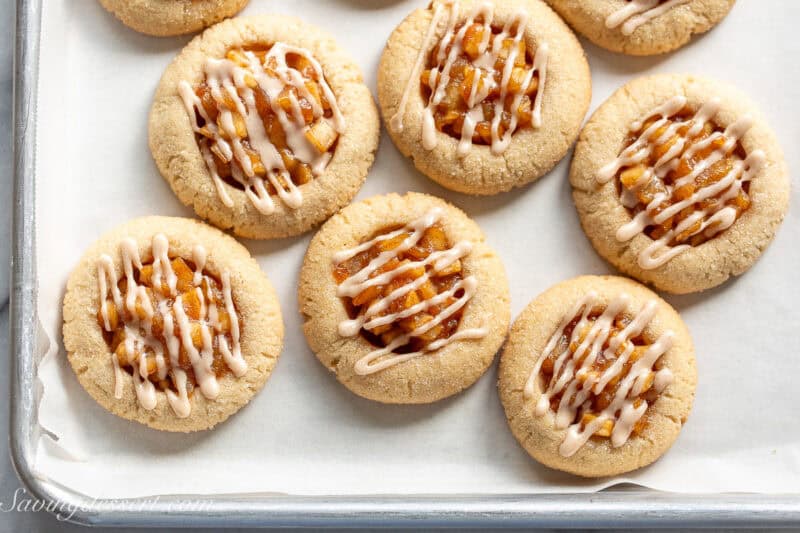 A small tray of apple pie cookies with a cinnamon sugar drizzle on top.