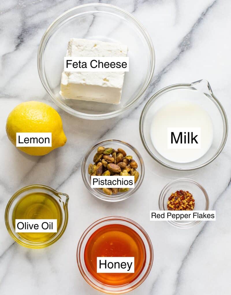 A collage of ingredients needed to make whipped feta with honey.