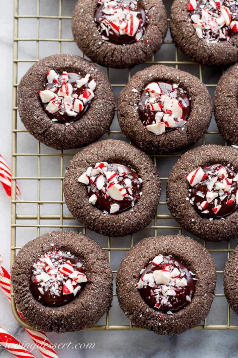 Chocolate Peppermint Thumbprint Cookies on a cooling rack.