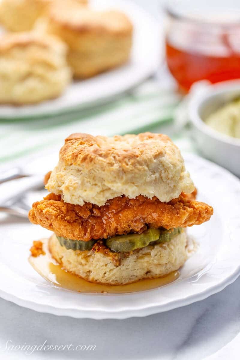 A chicken biscuit on a plate.