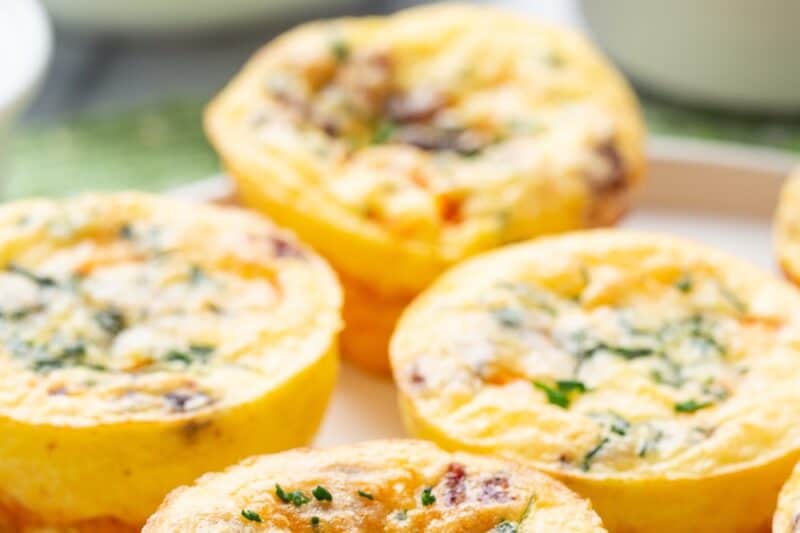 A closeup of egg muffins on a plate.