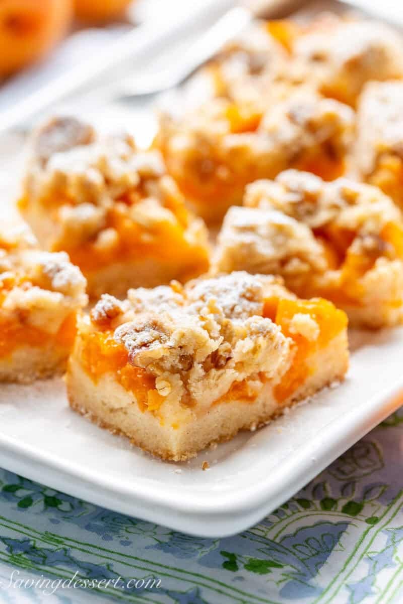 A platter filled with apricot crumble bars.