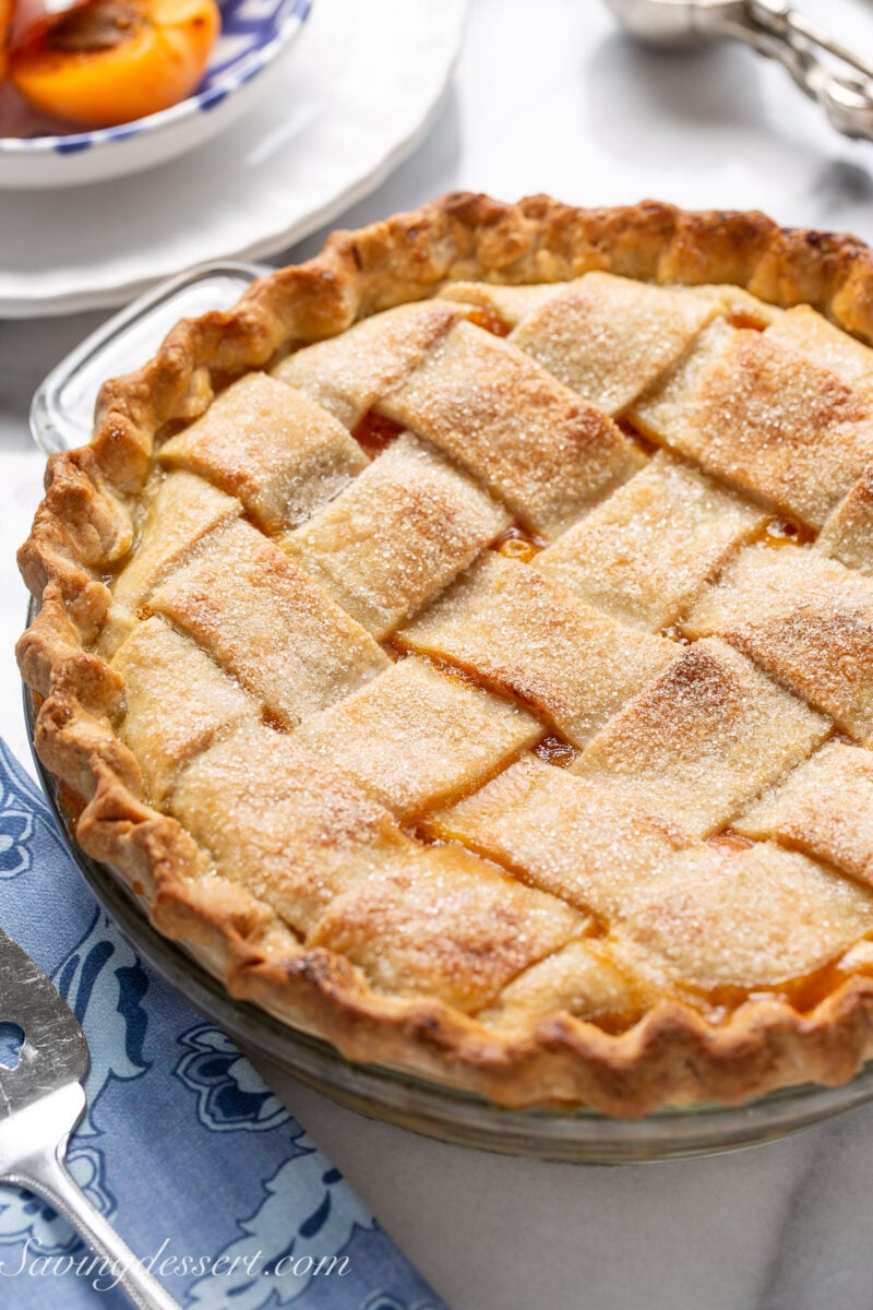 A lattice topped apricot pie ready to serve.