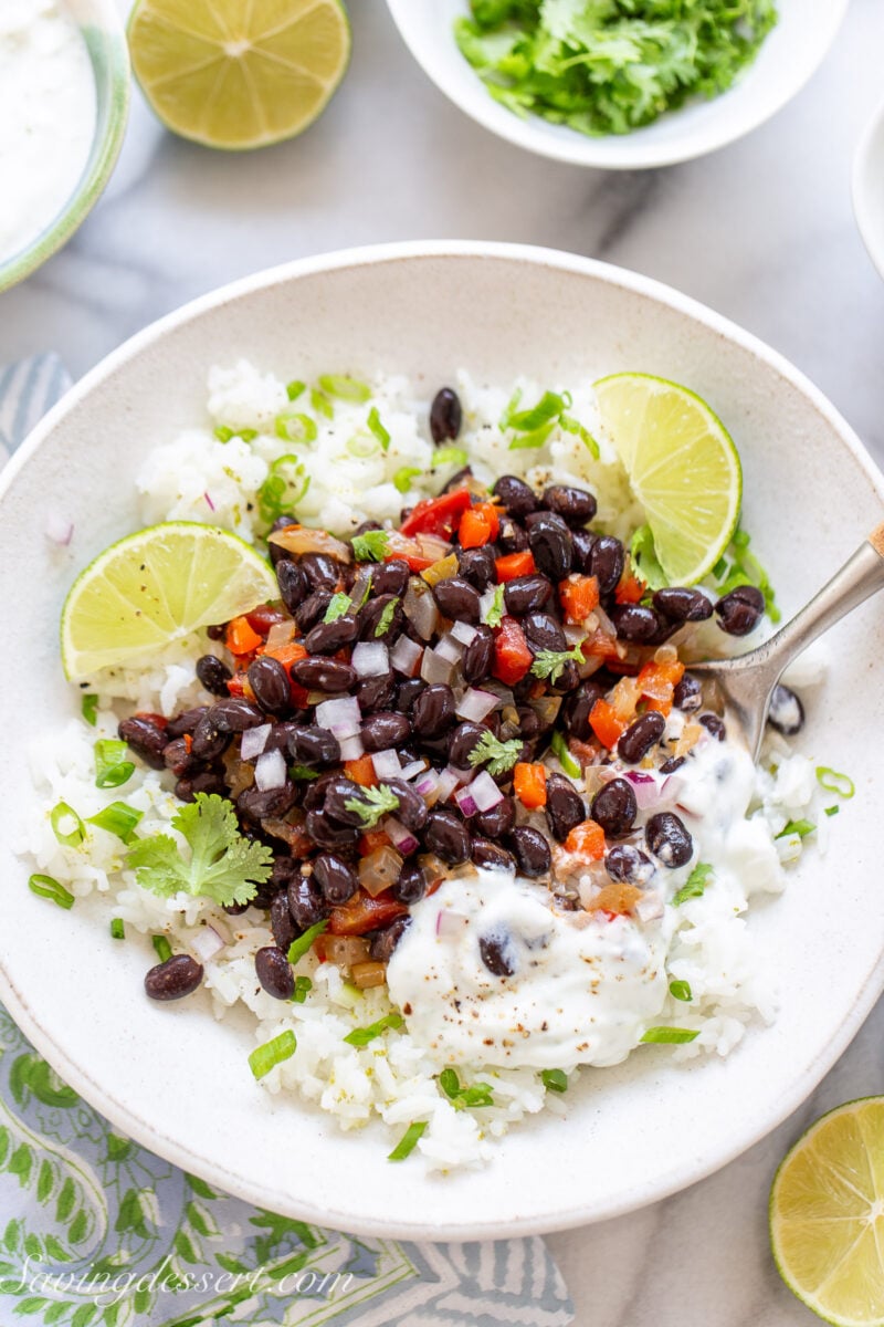 An overhead view of a bowl of black beans and rice.