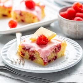 Lemon Raspberry Bars with fresh raspberries on top.