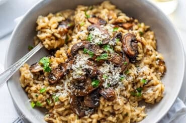 A closeup photo of a bowl of mushroom risotto.