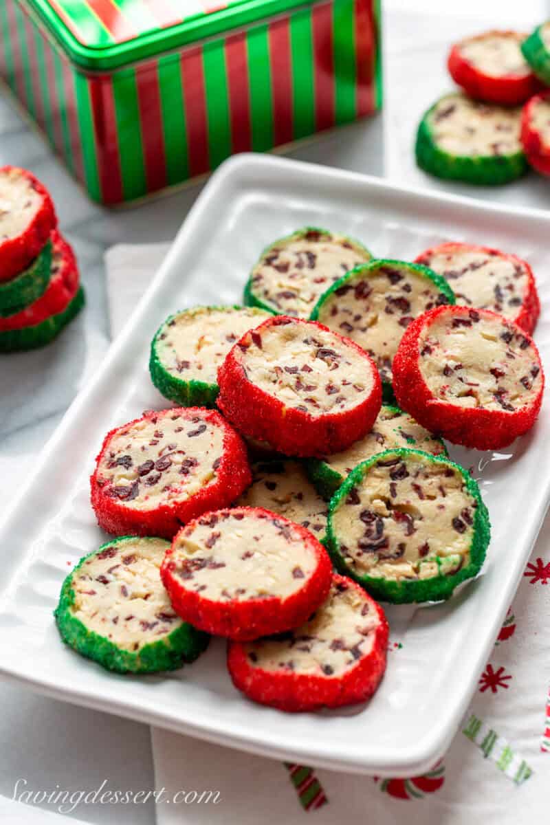 A platter filled with festive holiday shortbread cookies.