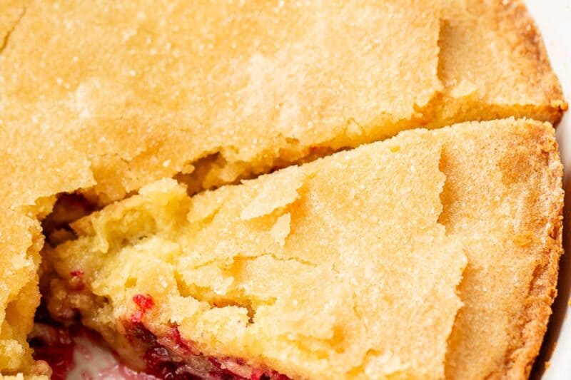 Nantucket pie with a slice removed and another cut and ready to serve.