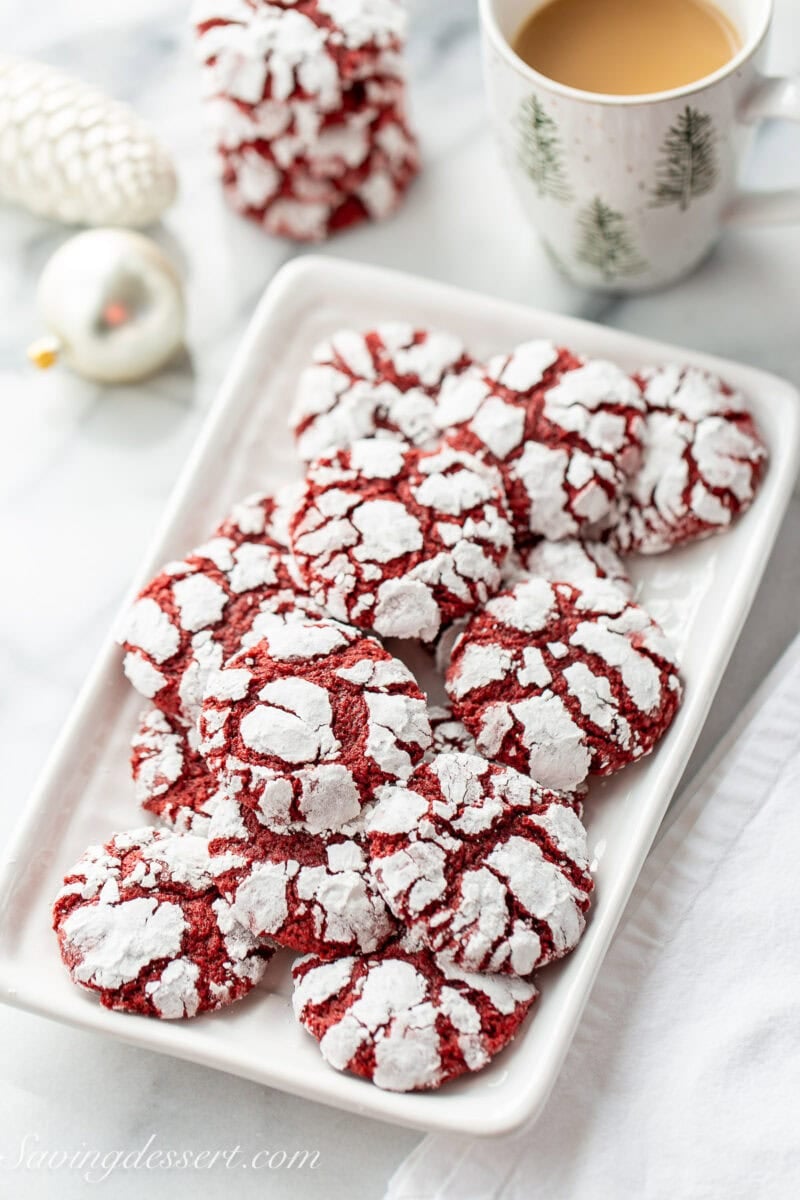 An overhead view of a small platter of red velvet crinkle cookies.