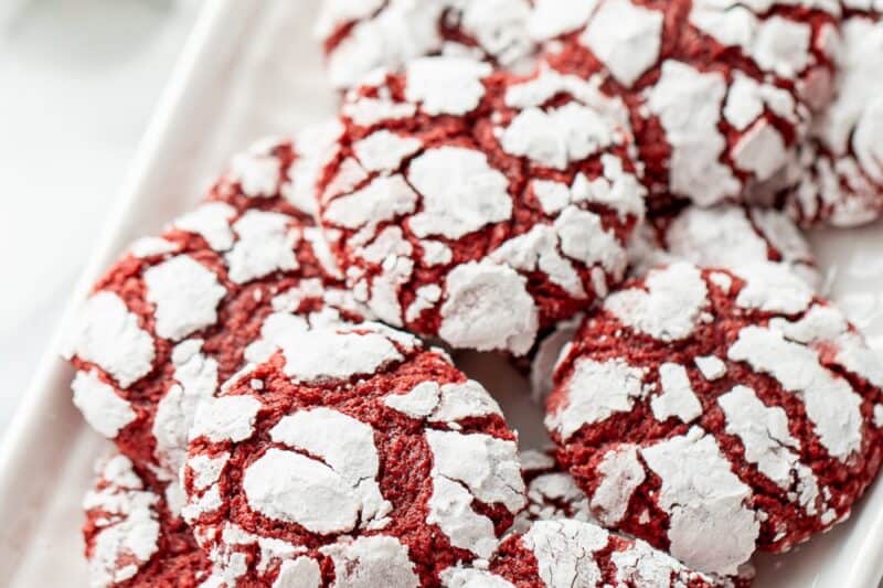 A small platter of red velvet crinkle cookies.