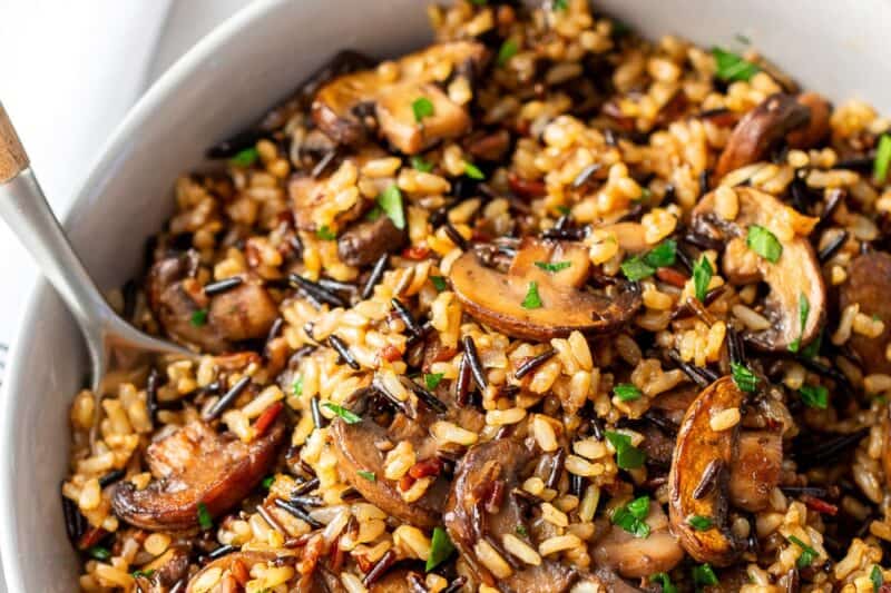 An overhead shot of a bowl of wild rice and mushrooms.