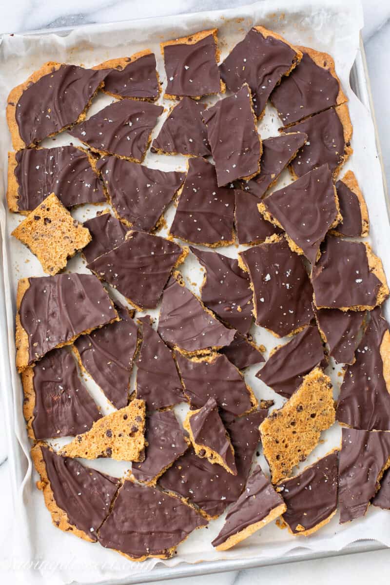 An overhead view of a baking pan filled with cookie bark.